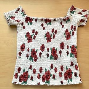 White rose over the shoulder Hollister crop top.